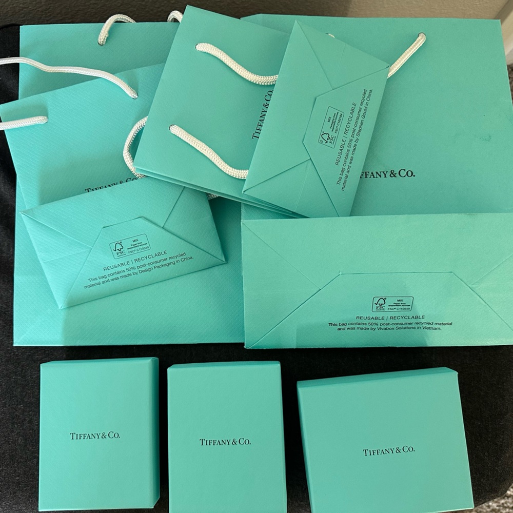 Authentic Tiffany Bags and Boxes with filler and ribbon
